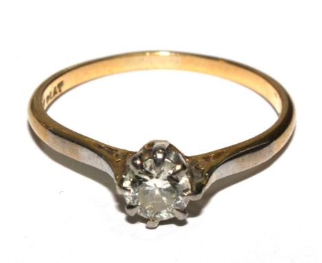 A single stone diamond ring set in 18 carat gold and platinum 