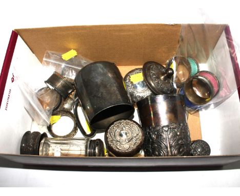 A small collection of silver plate, some silver lidded glass jars, three enamel napkin rings, a child's miniature tea set in 