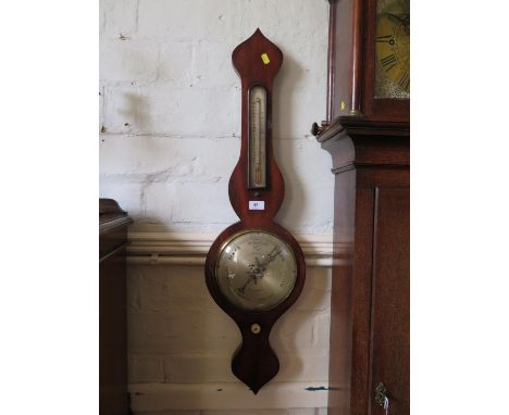 A 19th century mahogany banjo barometer, the shaped case holding an alcohol thermometer, and silvered dial inscribed J. Woodh
