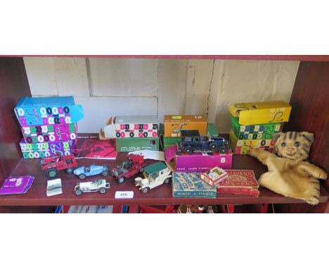 Rio: Eleven veteran cars in boxes and catalogue, five Lesney, card games and a glove puppet 
