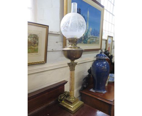 A late Victorian brass and marble oil lamp, with brass reservoir, marble stem and stepped square base, 56 cm high converted f