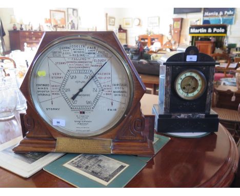 A Short &amp; Mason Stormoguide barometer, in a hexagonal mahogany frame with a brass plaque, on a later bracket, 46 cm wide,
