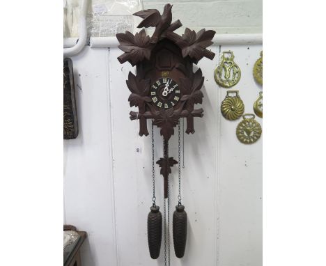 A Schatz 8-day cuckoo clock, with twin weights and repeat mechanism, 32 cm high 