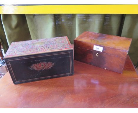A mid Victorian ebony and brass inlaid tea caddy, with boullework hinged lid and key escutcheon, containing two lidded compar