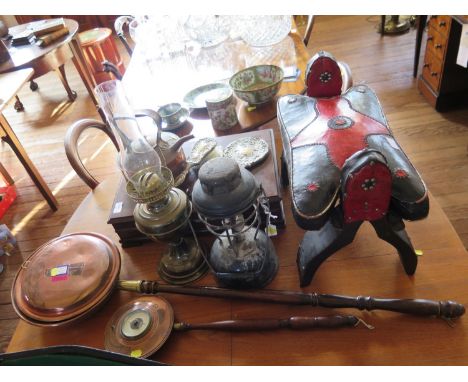 A blacked metal oil lamp, a brass oil lamp, various copperwares, a silver plated dressing table set, a canteen of Community c