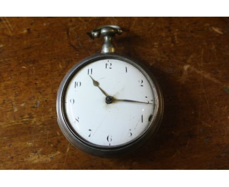 POCKET WATCH - A stunning silver pair cased pocket watch with white enamel dial & Arabic numeral markers. Beautiful key wind 