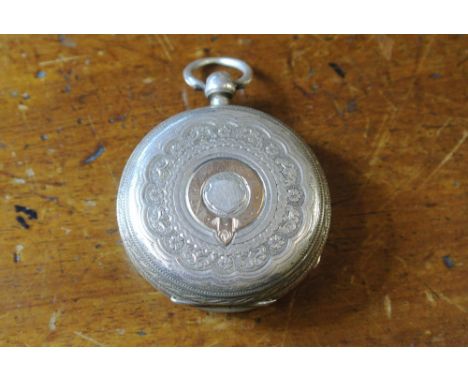 POCKET WATCH - A silver cased pocket watch with stunning decorative engraved case & silver dial, with Roman numeral markers &