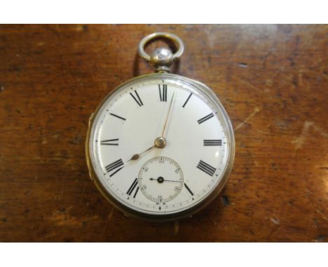 POCKET WATCH - A silver cased key wind pocket watch with enamel dial & subsidiary seconds dial. Case is lacking rear piece. T