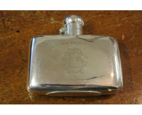 SILVER HIP FLASK MONGRAMED ERB: A solid silver rectangular form hip flask with flip top lid and monogram to front for initial