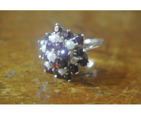 SILVER & 9CT GOLD RING: A stunning imitation diamond and ruby cluster dress ring. Prong set round stones  in silver setting. 