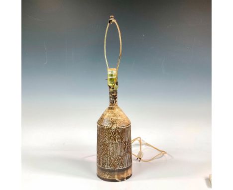 Artfully crafted wheel-thrown lamp base with impressed geometric texture pattern applied to body. Brushed white enamel glaze 