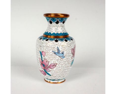 A copper and enamel vase with a white ground and decorated with purple flowers with blue leaves. Dimensions: 2.5"W x 4"HCount