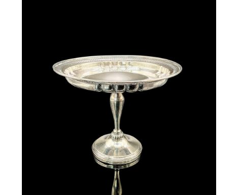 This antique Revere footed compote dish boasts sterling silver construction, enhancing its allure with a touch of luxury and 