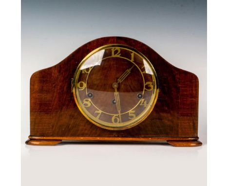 A beautiful wooden clock with brass numbers and handles. Includes key. St. Mich. Whitt. Westm. Silent marked on the frame. Is