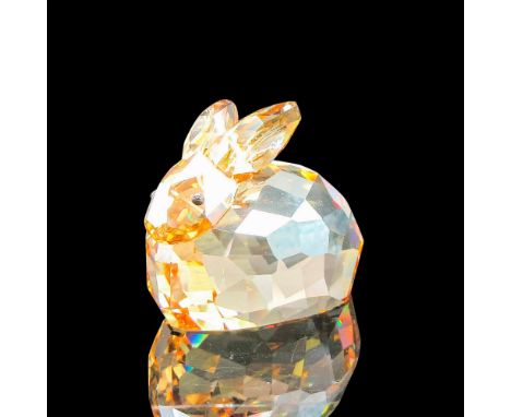 Clear, faceted sitting amber figural with jet crystal eyes. Swarovski backstamp. 1089876. This item has its original box: 2.5