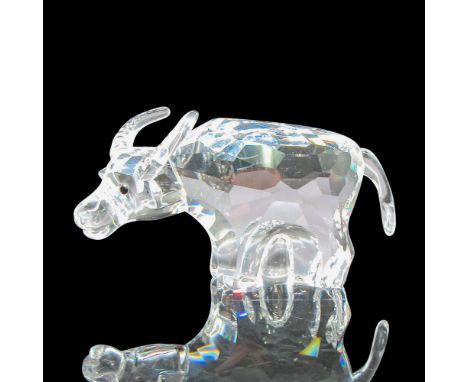 Miniature crystal figurine with crystal body, antlers, and tail standing on all four legs. Black crystal eyes. Part of the Ch