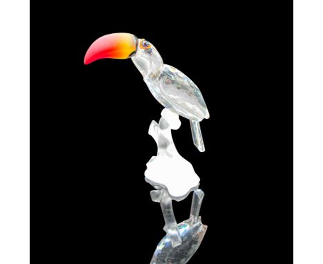 Part of the Feathered Beauties collection. Figural has fire opal crystal beak with blue iridescent eyes, sitting on a frosted