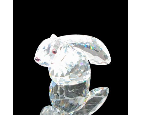 Figural has clear faceted body, large ears back with black eyes and nose. Swarovski backstamp. 208326. This item has its orig