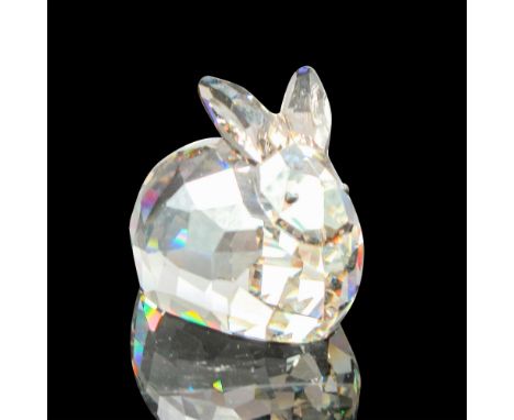 Smokey, faceted sitting crystal figural with black button eyes. Swarovski backstamp. 1089977. This item has its original box: