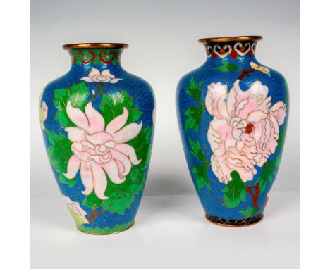 2 brass vases decorated in an enamel blue ground with floral blossomed branches and birds. Dimensions: 3.5"W x 6"HCountry of 