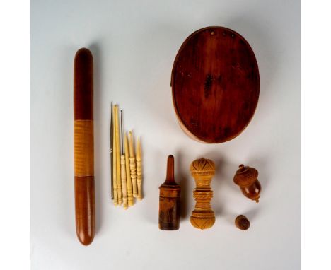 Includes 1 covered oval box that contains 2 needle holders, and 1 carved acorn with 1 thimble inside. As well as 1 crochet ho