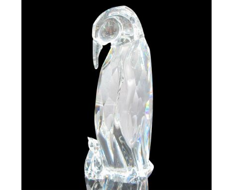 Clear faceted figural looking down at baby. Swarovski backstamp. This item has its original box: 6.5"H x 3.25"dia. Issued: 20