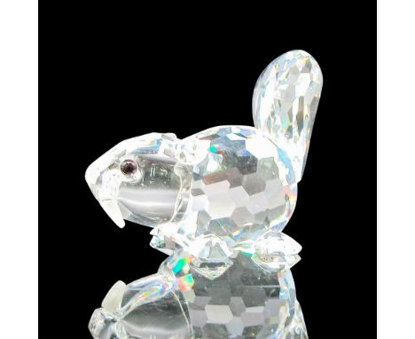 Part of the Endangered Species group. Clear crystal figural with tail up, black eyes and frosted teeth. Swarovski backstamp. 