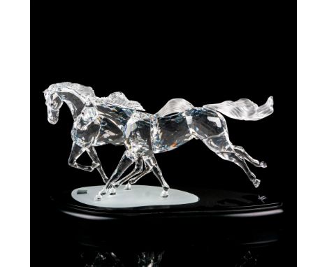 Limited edition sculpture with booklet. Pair of horses with black and tawny crystal eyes. Limited edition 6347 of 10000. Swar