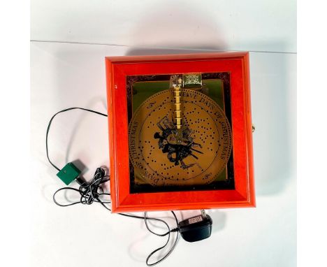 A beautiful music box contained in wood case with glass cover pane and disk storage drawer. Includes sixteen music discs, ins