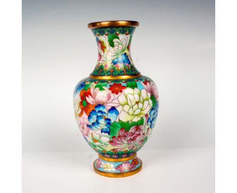 A small copper vase adorned with an array of colorful enamel flowers. Copper accents and trims. Dimensions: 4.25"W x 7.25"HCo
