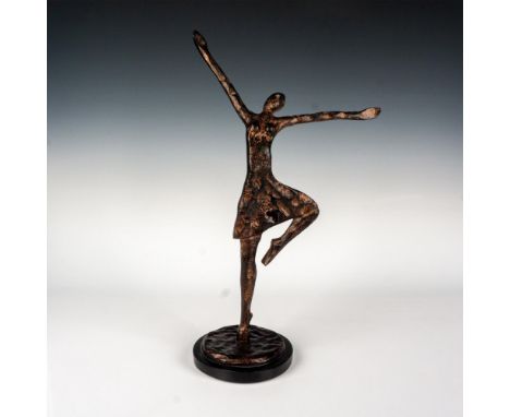 Abstract figural sculpture modeled as a ballerina with arms outstretched; hammered metal texture with black and copper color 