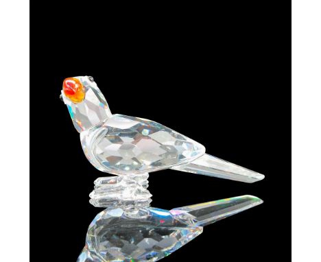 Clear faceted body with colored beak and black beaded eyes. Swarovski backstamp. 7621000009. This item has its original box: 