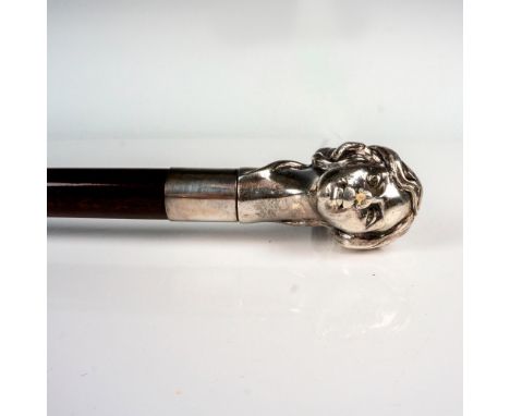 A 33-inch cane with a sterling silver handle molded as a woman with long flowing hair. Sterling Silver 925 impressed stamp on