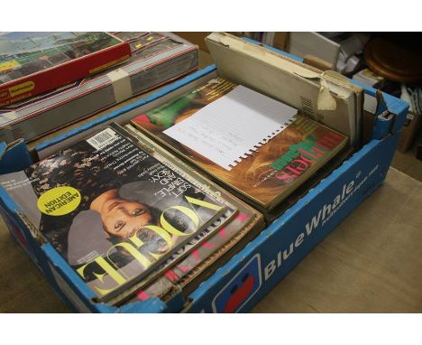 Box of vintage Vogue magazines
