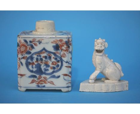 An Oriental Imari tea caddy and small porcelain dog of Fo