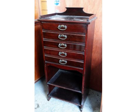 MAHOGANY RAIL-BACK FIVE DRAWER MUSIC CABINET with a two shelf base