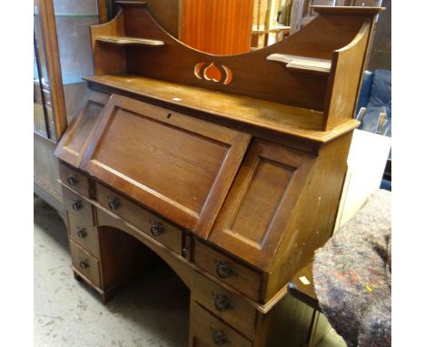 VINTAGE OAK ART NOUVEAU STYLE KNEE-HOLE DESK with shelf top and bank of four drawers to either side