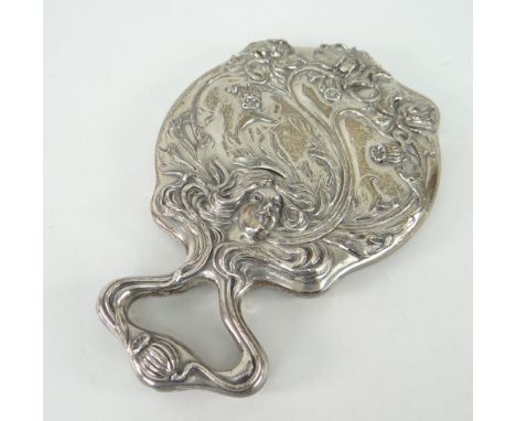 ART NOUVEAU STERLING SILVER BACKED VANITY MIRROR decorated in relief with flowers and female face