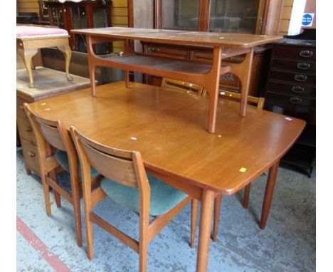 MID CENTURY LIGHT TEAK EXTENDING DINING TABLE with four matching cushioned chairs, together with a similar matching long-John