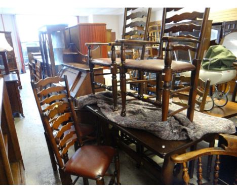 REFECTORY TABLE WITH SET OF 4+2 LADDER BACK CHAIRS having studded brown leather seats, comprising four carvers and two smalle