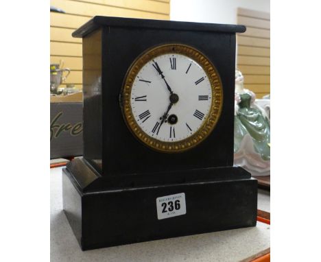 BLACK SLATE MANTEL CLOCK with Roman numerals on a circular face