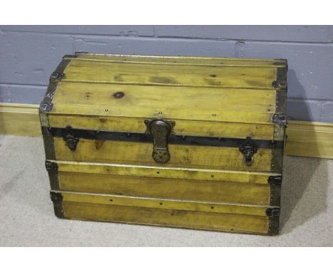 20th Century light wood trunk, iron and wood bounded, the top opening to reveal a removable shelf, 76.5cm wide