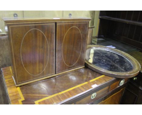 Late Victorian mahogany hanging cupboard, the inlaid doors opening to reveal an adjustable shelf, 53cm wide, together with an