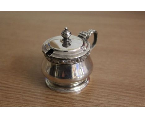 Elizabeth II silver mustard pot, Birmingham 1959, maker Adie Brothers Ltd, with acanthus leaf capped handle and stepped lid a