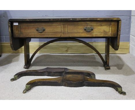 Regency style mahogany sofa table, the rectangular top with drop flaps above a pair of frieze drawers and opposing dummy draw