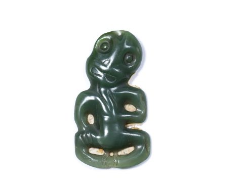 Maori hei-tiki pendantNew Zealand, made of green nephrite, depicted with the head tilted to the right, with an old paper labe