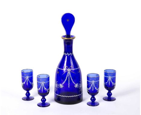 Bristol blue glass decanter and four glassespainted in enamels with swags of flowers, decanter 34.5cm high, glasses 11.5cm hi