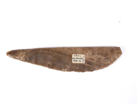 Egyptian flint bladePredynastic period, leaf-shaped with serrated edges, 20cm acrossProvenance: Inherited by the vendor's lat
