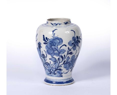Delft blue and white vaseDutch, circa 1800, painted with a bird and flowers in the Chinese Kangxi style, 23.5cm high Conditio