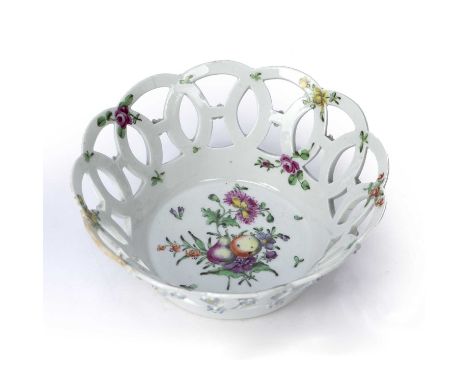 Early Worcester basketcirca 1758-60, circular with pierced sides and applied with florets, painted in colours with 'spotted f